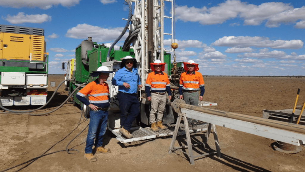 Team with drilling rig at theLindfield Vanadium Project in Queensland